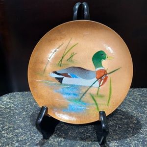 Duck metal plate